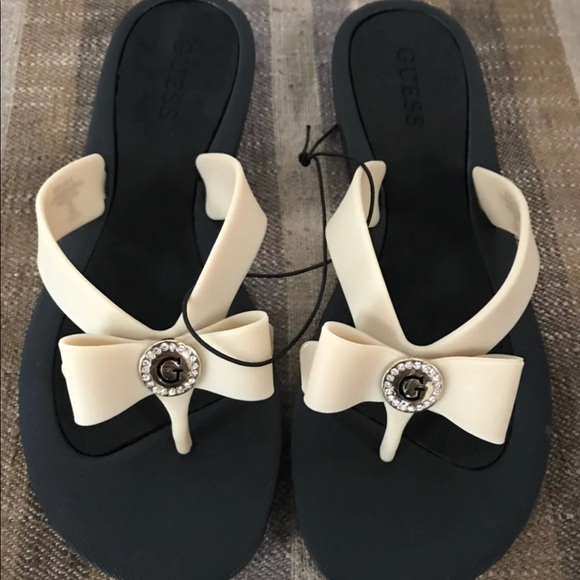 guess bow tie flip flops